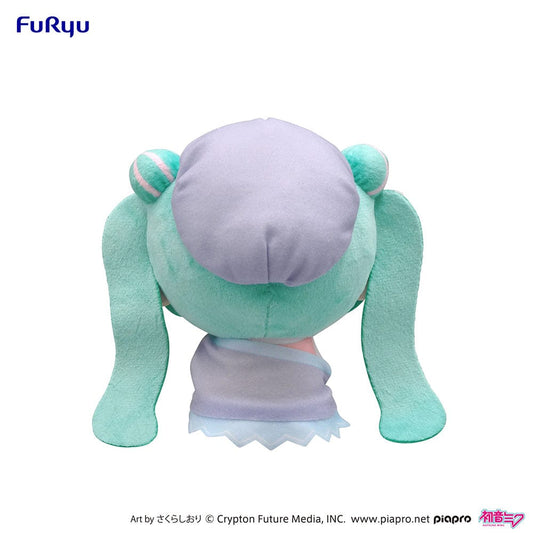 Soft and cuddly Hatsune Miku MOCHIPICO plush toy dressed in a Love Blazer, smiling joyfully, with detailed teal pigtails adorned with pink bows, perfect for collecting or gifting.