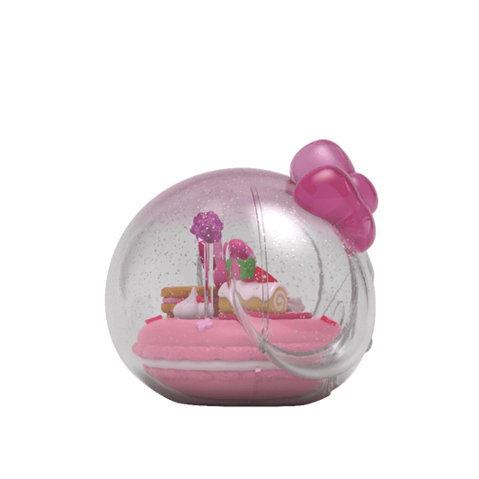 Kandyland: Sanrio My Melody figure, featuring My Melody sitting in a candy-themed setting inside a sparkling globe with pink heart balloons and various sweets, encapsulating a whimsical and colorful scene.