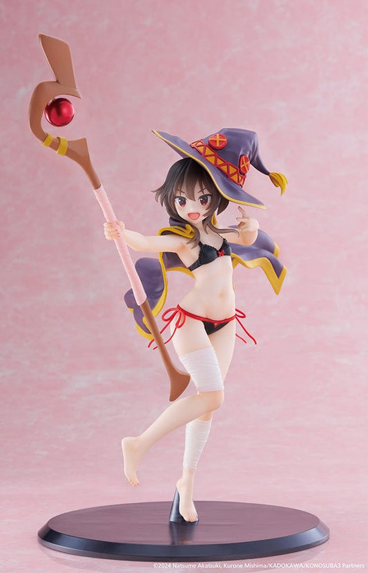 KonoSuba's Megumin Coreful Figure presented in a Swimwear Version, energetically wielding her staff, adorned with her signature hat and a playful swimsuit. The figure captures her mischievous smile and readiness for summer fun, reflecting her explosive character from the beloved anime series.