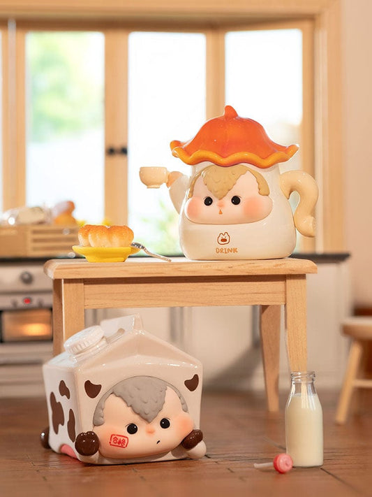 A Life of Mischief Series Mini Trading Figures displayed in a cozy room setting, featuring various playful characters in unique, everyday scenarios, perfect for collecting and adding a playful touch to any environment.