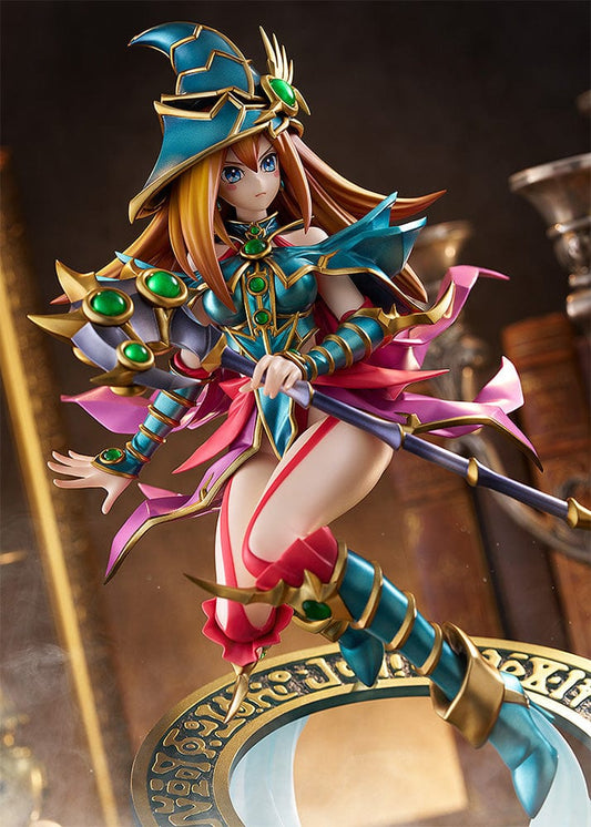 Detailed Yu-Gi-Oh! Magician's Valkyria figure, featuring ornate teal and gold armor, a large whimsical hat, and a flowing pink cape, posed with a staff on a circular rune-inscribed base