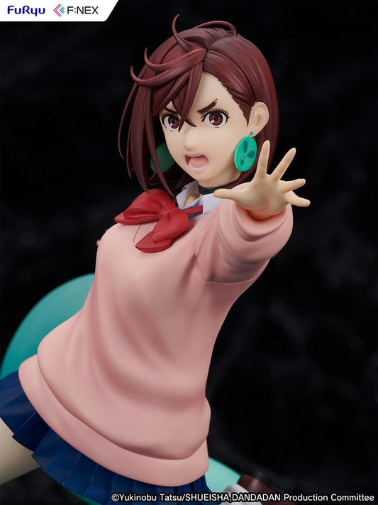 Dandadan Momo Ayase 1/7 Scale Figure in a dynamic action pose with a pink sweater, blue skirt, and a clawed hand base.