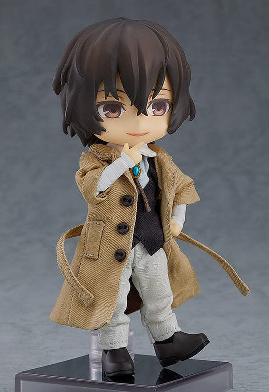 Bungo Stray Dogs Nendoroid Doll Osamu Dazai (Reissue) - A charming Nendoroid Doll figure of Osamu Dazai from the anime series Bungo Stray Dogs. Osamu Dazai, dressed in his signature outfit, stands in a dynamic pose with a mischievous smile. He holds a small book in one hand, exuding a whimsical and intellectual aura. This reissued collectible captures the character's personality and essence, making it a must-have for fans and collectors alike.