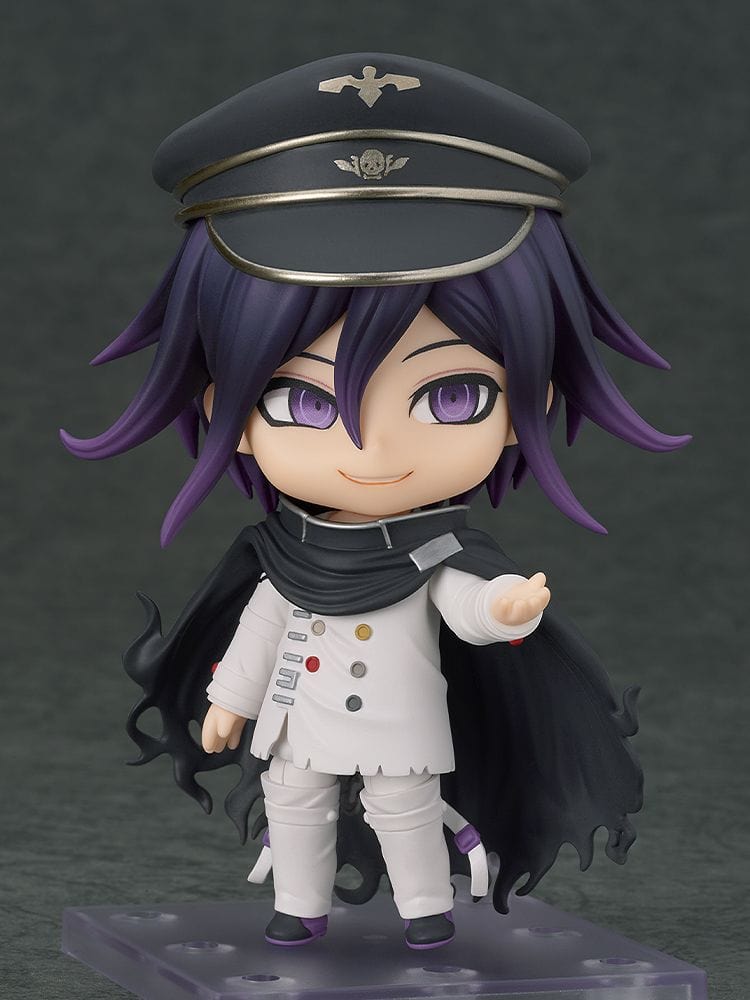 Nendoroid Kokichi Oma from Danganronpa V3: Killing Harmony in white uniform, black cloak, leader’s hat, and purple hair, smiling with open arms.