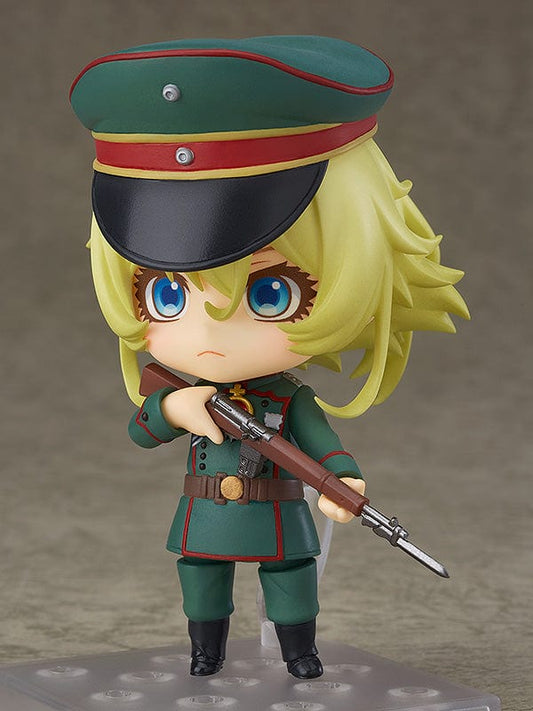 Saga of Tanya the Evil Nendoroid No.784 Tanya Degurechaff, depicted in her military uniform, pondering a strategy, complete with detailed accessories and interchangeable parts for various expressions, capturing her fierce and tactical nature.