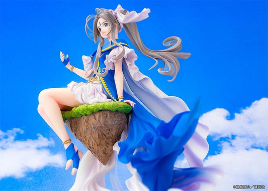 Oh My Goddess! Belldandy figure seated on a rock, dressed in a flowing blue and white gown with gold accents, exuding elegance and grace.