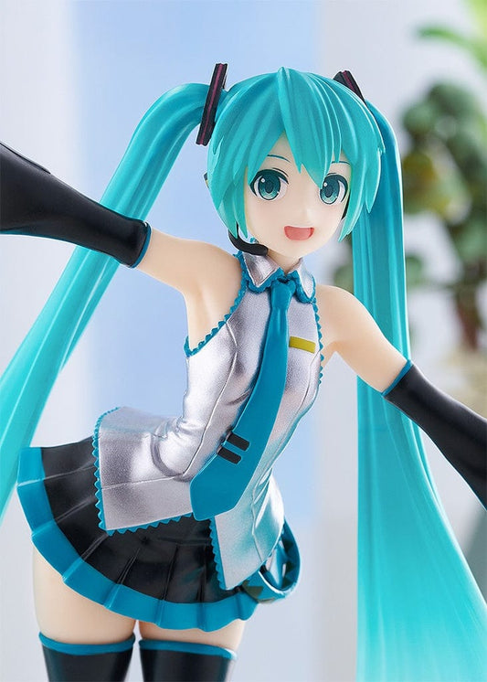 Vocaloid Pop Up Parade Miku Hatsune in a translucent color version, with her iconic turquoise twintails and a cheerful expression. She is dressed in her signature outfit, modified with translucent elements that give her a luminous and ethereal appearance.
