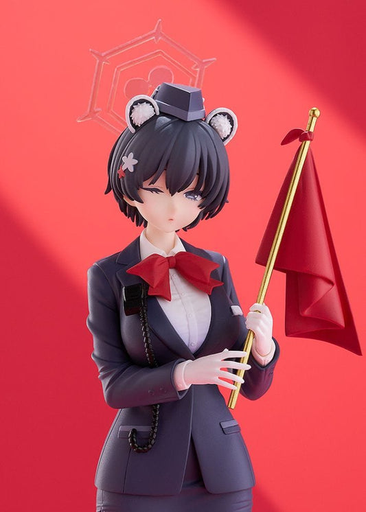 Blue Archive Pop Up Parade figure of Tsubaki Kasuga in her Guide uniform holding a red signal flag with eyes closed and a calm expression.