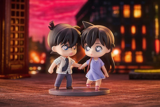 Detective Conan Qset+ featuring Nendoroid figures of Shinichi Kudō and Ran Mōri, hand-in-hand, reflecting their enduring relationship from the anime series.