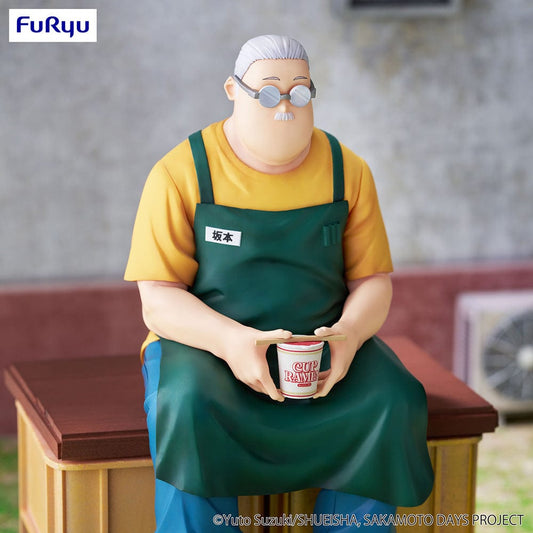 Sakamoto Days Taro Sakamoto Noodle Stopper Figure holding a cup of ramen, seated in a green apron and blue pants.