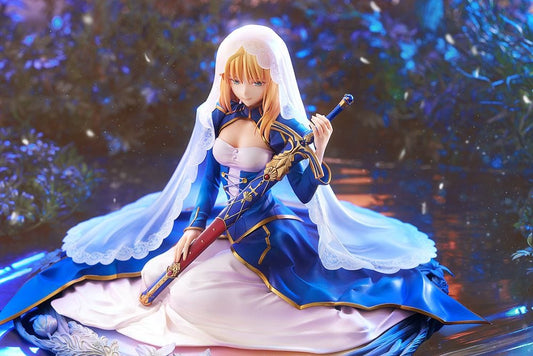Fate/stay night Saber (Garden of Avalon Ver.) 1/7 scale figure seated in a white and blue dress with veil and Excalibur, on a floral decorative base.