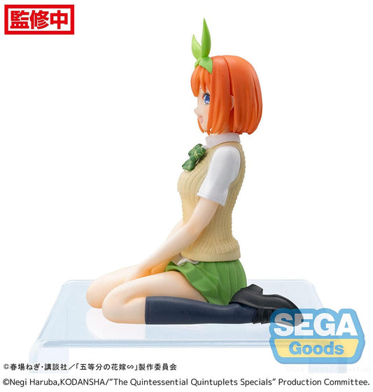 The Quintessential Quintuplets Yotsuba Nakano Premium Perching Figure, depicting Yotsuba in her signature outfit with bright orange hair and a cheerful smile, seated on a clear base.