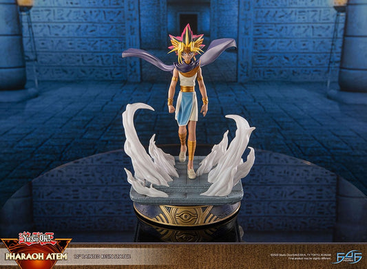 Yu-Gi-Oh! Pharaoh Atem Limited Edition Statue featuring the ancient ruler in his traditional regalia with headdress and flowing cape, perched on an Egyptian-themed pedestal, capturing his commanding presence in a finely detailed resin sculpture.