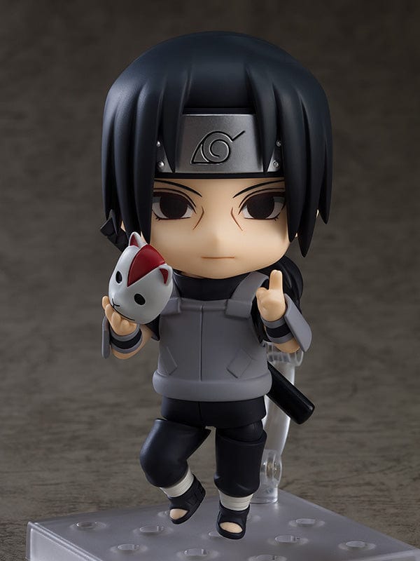 Naruto Shippuden Nendoroid No.1726 Itachi Uchiha Anbu Black Ops Ver. holding an Anbu mask while wearing his Leaf Village uniform.