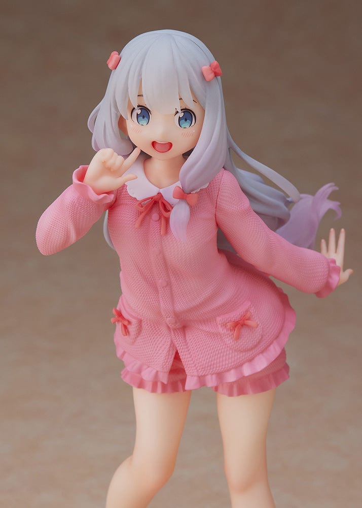 Coreful Sagiri Izumi figure from Eromanga Sensei in pink loungewear and bunny slippers, striking a playful pose on a clear base