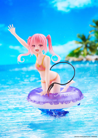 To Love-Ru Darkness Aqua Float Girls Nana figure featuring Nana with pink twin tails in a swimsuit posing on a purple float ring display base