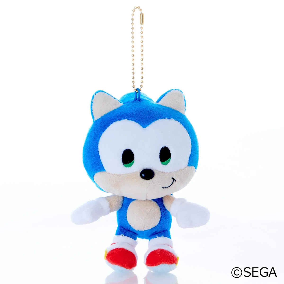 Sonic & Friends Sonic mascot plush with green eyes, white gloves, red shoes, and an attached ball chain.