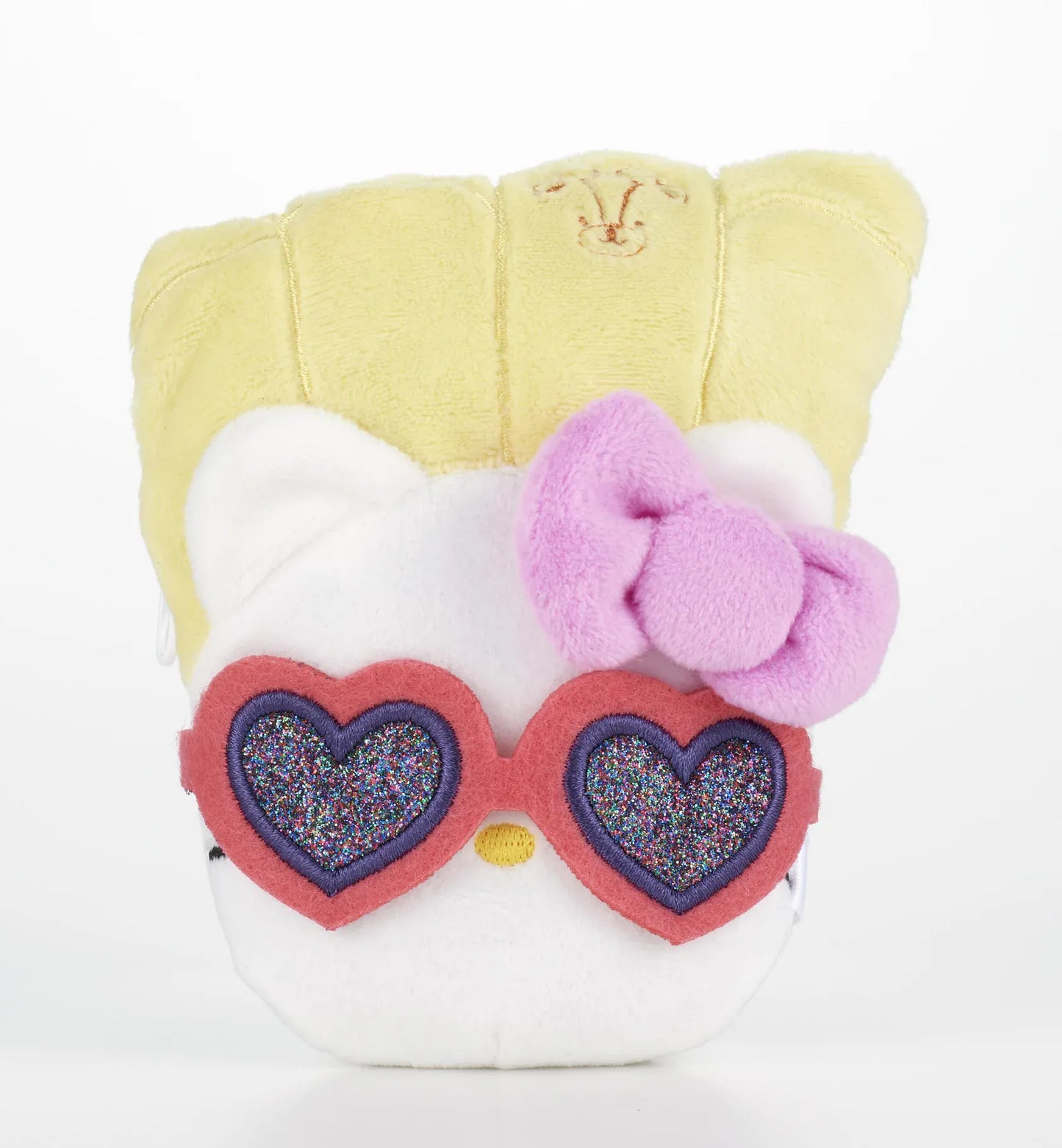 Kawaii YumYum MART DINER Hello Kitty POTATE plushie featuring golden potato-inspired details, a pastel-purple bow, and sparkly heart-shaped sunglasses.