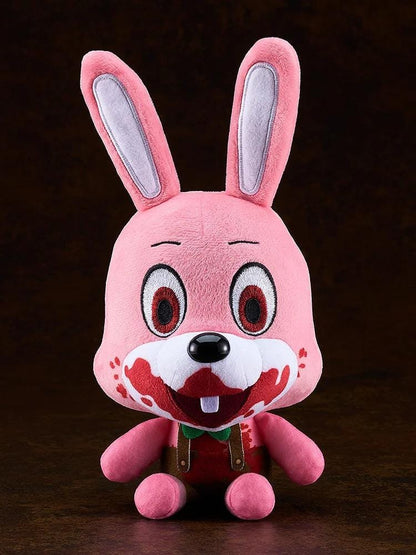 Silent Hill Robbie the Rabbit rerelease plushie with pink fur, long ears, red eyes, brown overalls, and a bloodstained mouth.