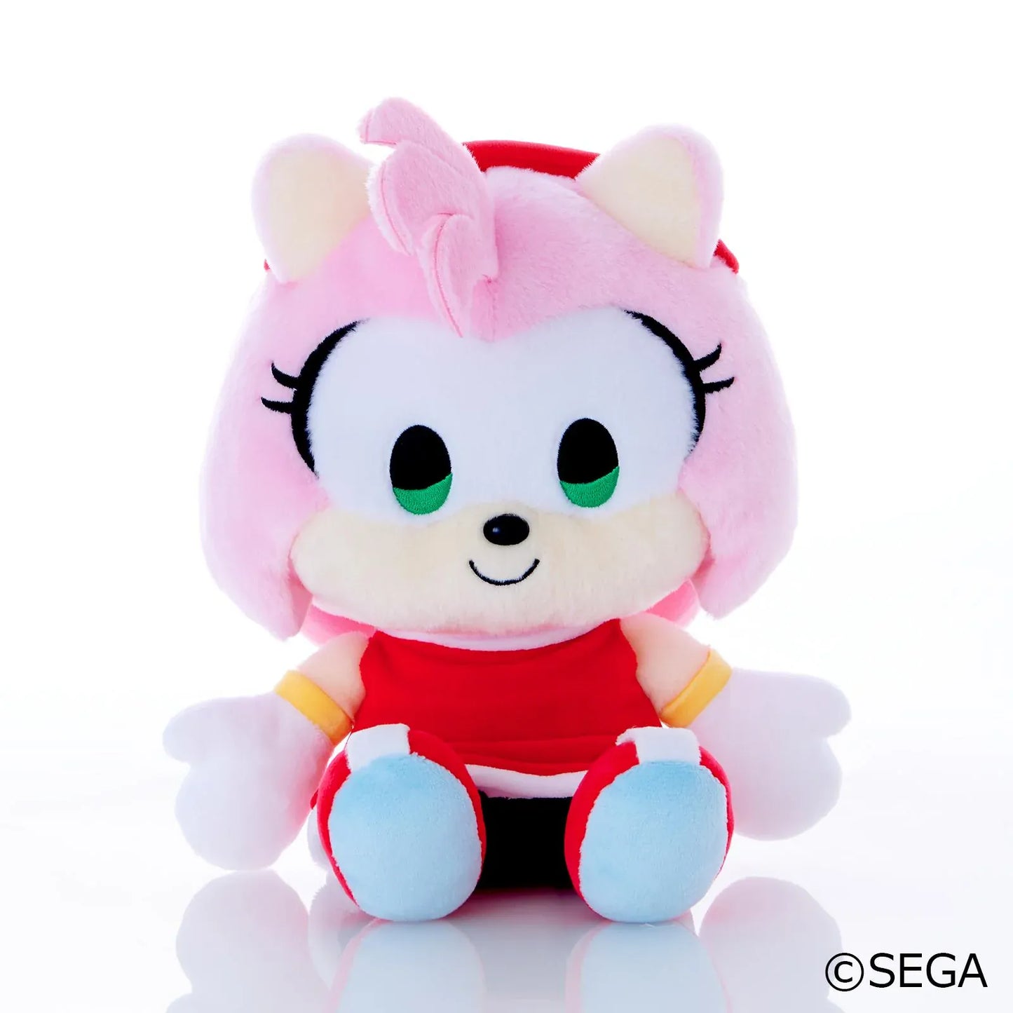 Sonic & Friends Amy medium plush with green eyes, a red dress, white gloves, and red shoes.