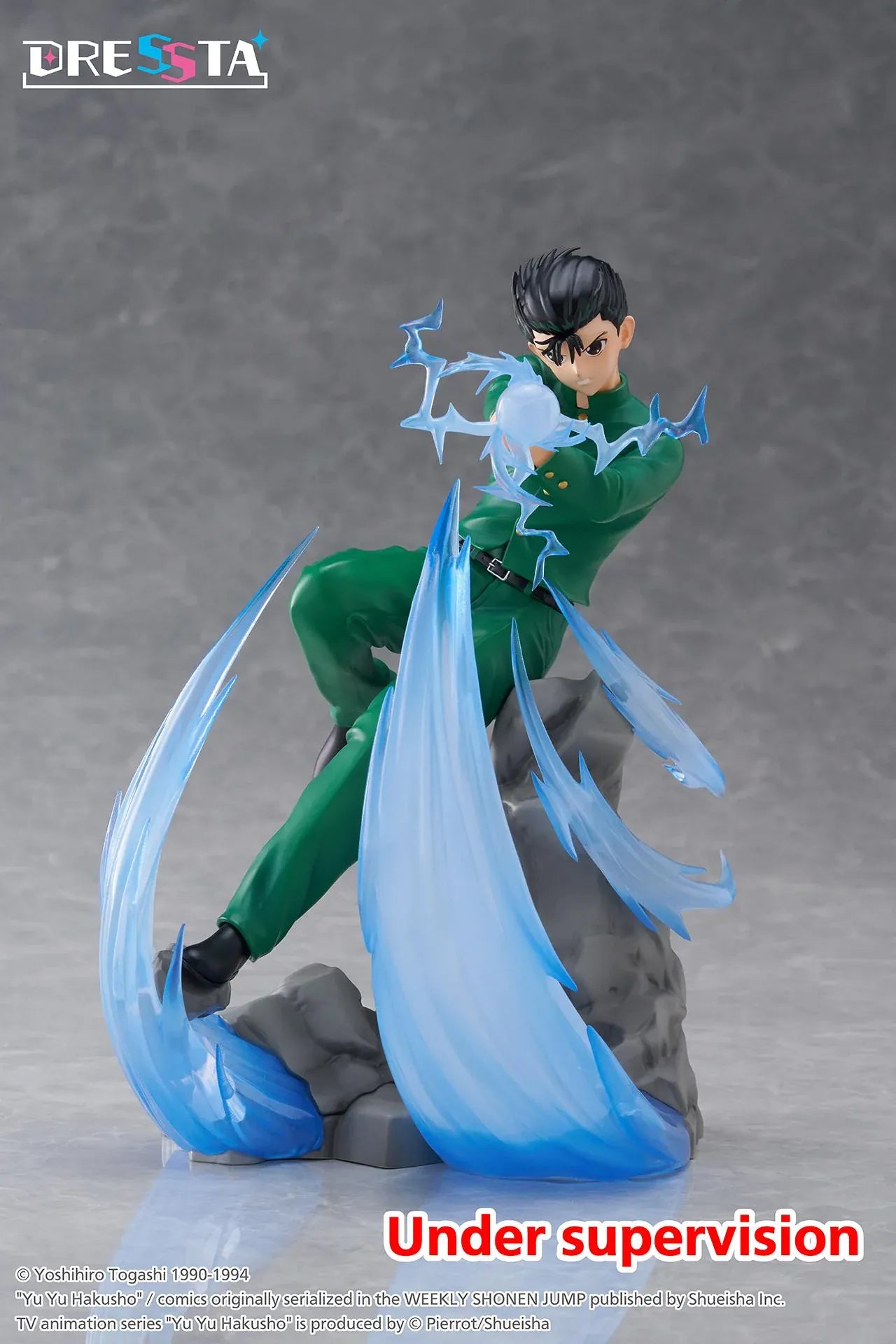 Yu Yu Hakusho Dressta Yusuke Urameshi Figure in green school uniform with blue spirit energy effect and rocky display base