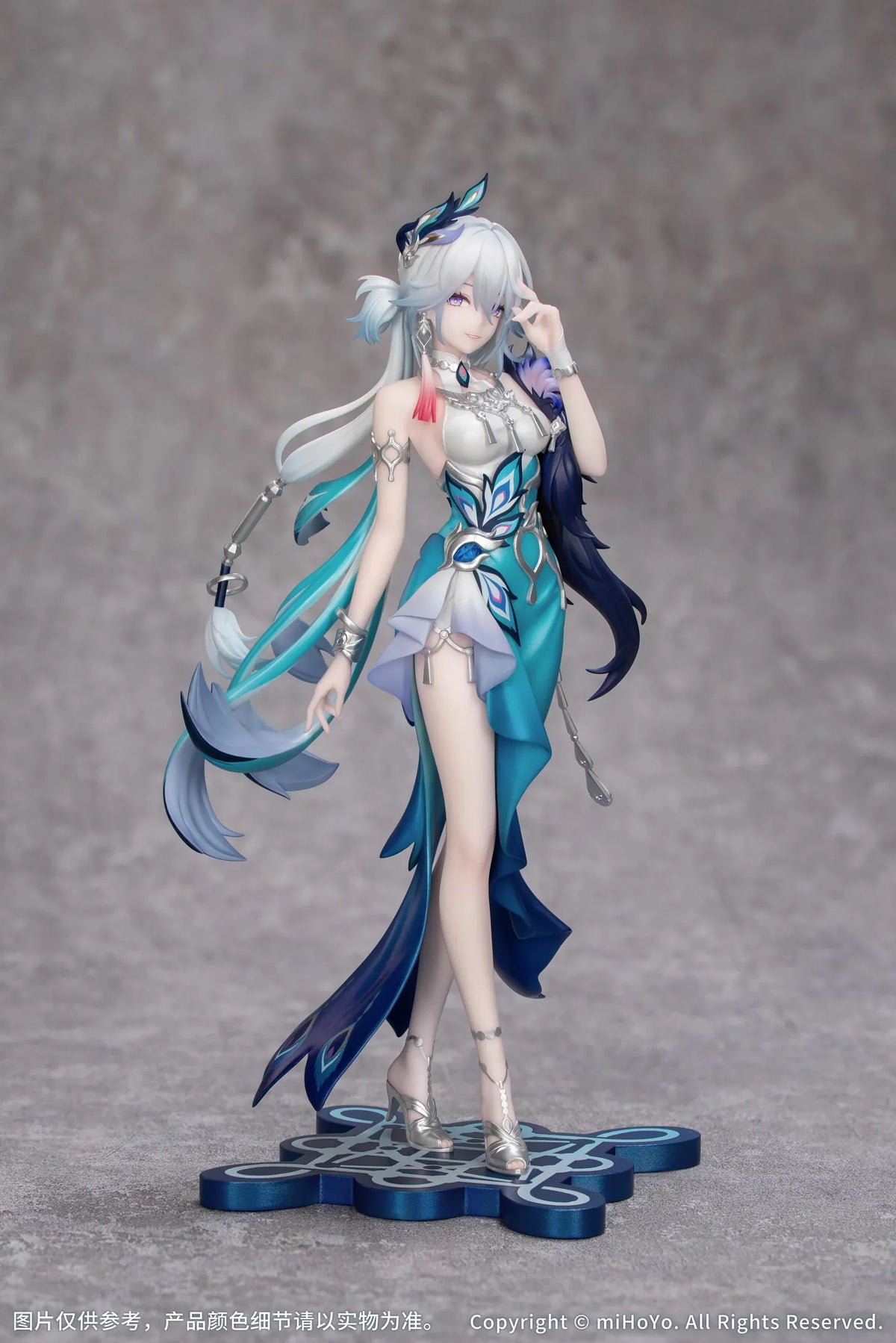 Yao Guang 1/8 scale figure wearing an elegant white-and-teal outfit with silver ornaments and feather-inspired decorations.