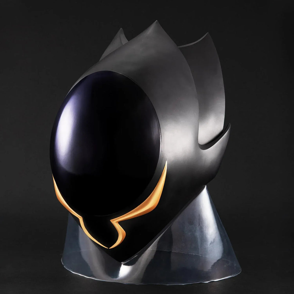 Code Geass Full Scale Works Zero’s Mask 1/1 scale replica with a glossy dark faceplate, gold accents, and an angular outer shell with tall fins.
