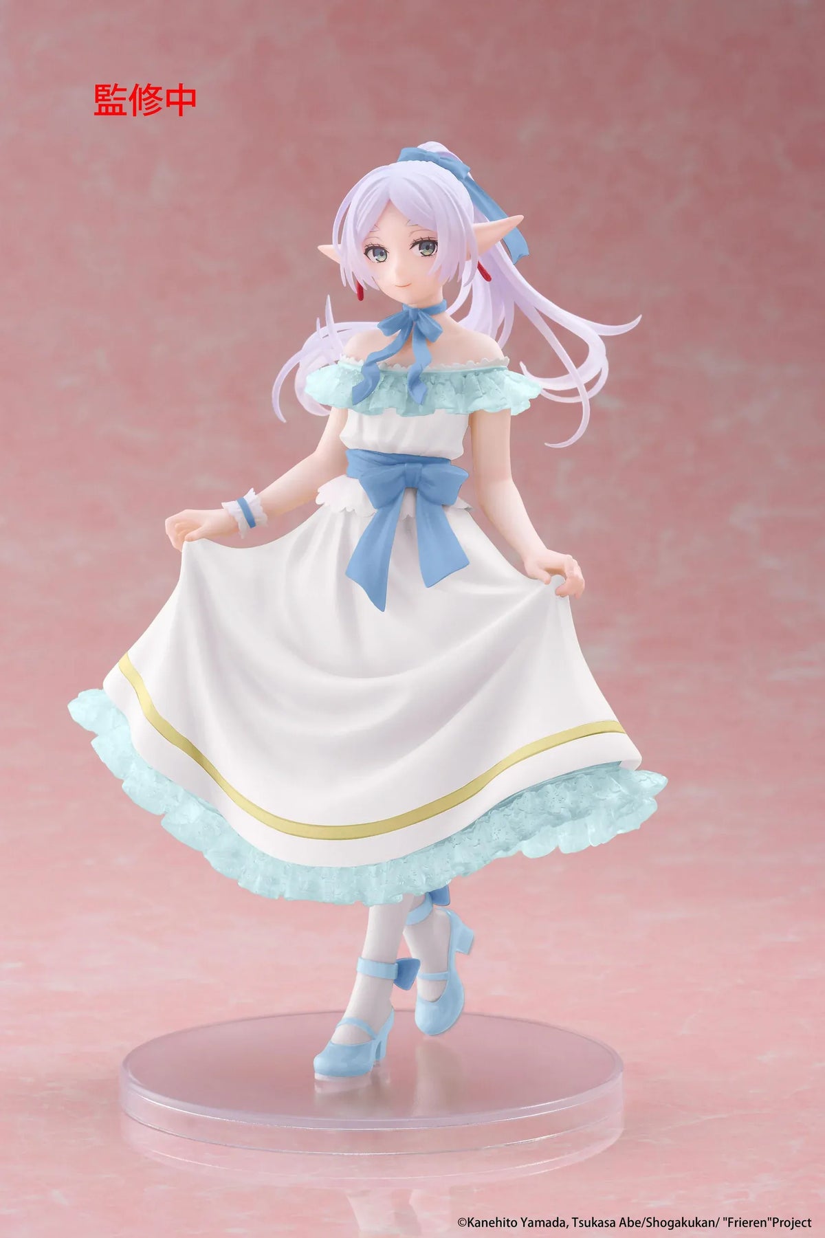 Frieren Beyond Journey's End Frieren Party Dress Ver. Coreful Figure (Rerelease) featuring a silver-white-haired elf with green eyes wearing an elegant white off-the-shoulder dress with light-blue ruffles, golden trim, blue ribbons, and matching heels while gracefully holding her skirt on a transparent circular base.