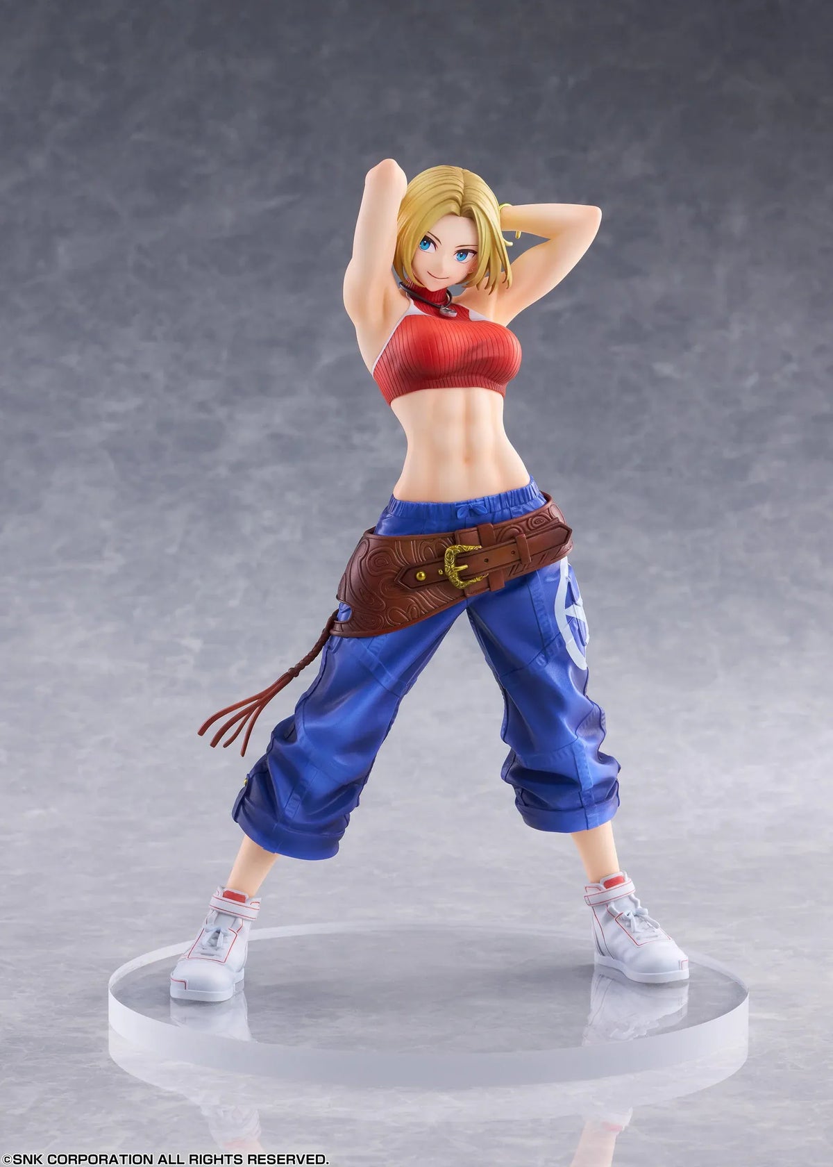 Blue Mary Limited Edition 1/7 scale figure wearing a red crop top, blue pants, brown belt, and white sneakers in a confident standing pose.