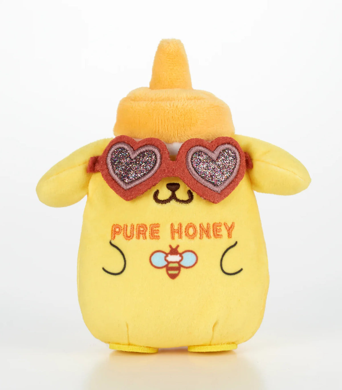 Kawaii YumYum MART DINER Pompompurin PURE HONEY plushie shaped like a yellow honey bottle with floppy ears, bee embroidery, and heart-shaped sunglasses.