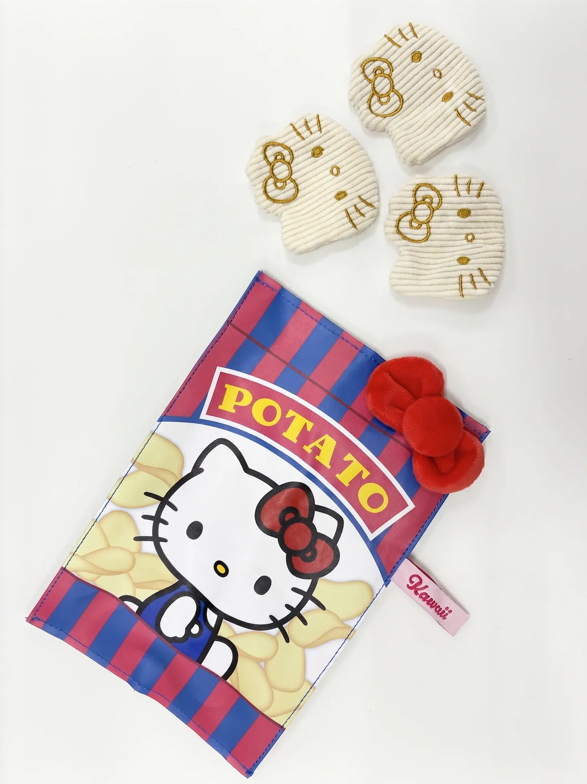 Kawaii YumYum MART Hello Kitty Potato Chips plush set featuring a red-and-blue snack bag and three character-shaped plush chips with gold embroidery.