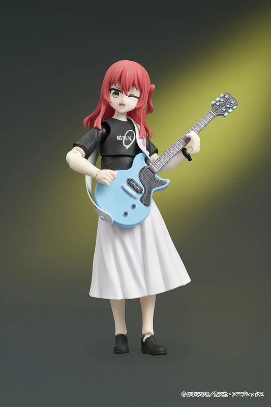 Bocchi the Rock! DIGACTION Ikuyo Kita figure winking while holding a light blue guitar, wearing a black band T-shirt and white pleated skirt.