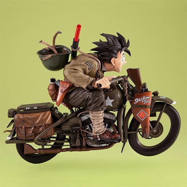 “Dragon Ball Z Desktop Real McCoy EX figure of Kid Goku riding a detailed military-style motorbike with gear and accessories.”