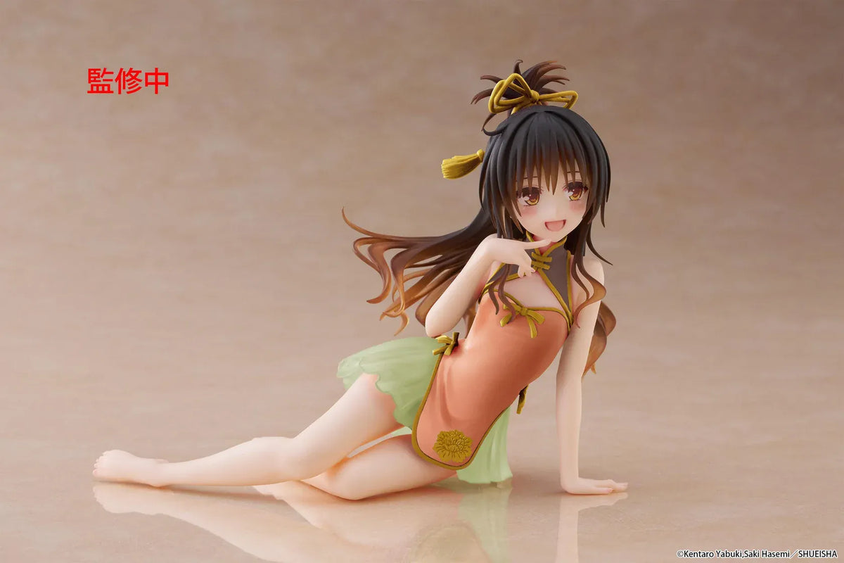 To Love-Ru Darkness Desktop Cute Mikan Yuki Chinese Dress Ver. Figure (Rerelease) featuring a brown-haired anime girl with golden eyes wearing an orange Chinese-style dress with gold trim, a light green ruffled skirt, and decorative hair ribbons in a seated pose.