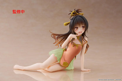 To Love-Ru Darkness Desktop Cute Mikan Yuki Chinese Dress Ver. Figure (Rerelease) featuring a brown-haired anime girl with golden eyes wearing an orange Chinese-style dress with gold trim, a light green ruffled skirt, and decorative hair ribbons in a seated pose.
