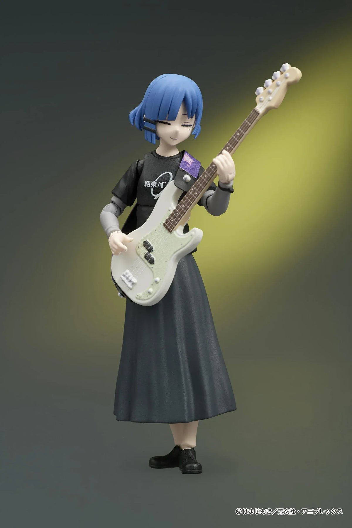 Bocchi the Rock! DIGACTION Ryo Yamada figure playing a cream-colored bass, with blue hair, closed eyes, a black band T-shirt, and long dark skirt.