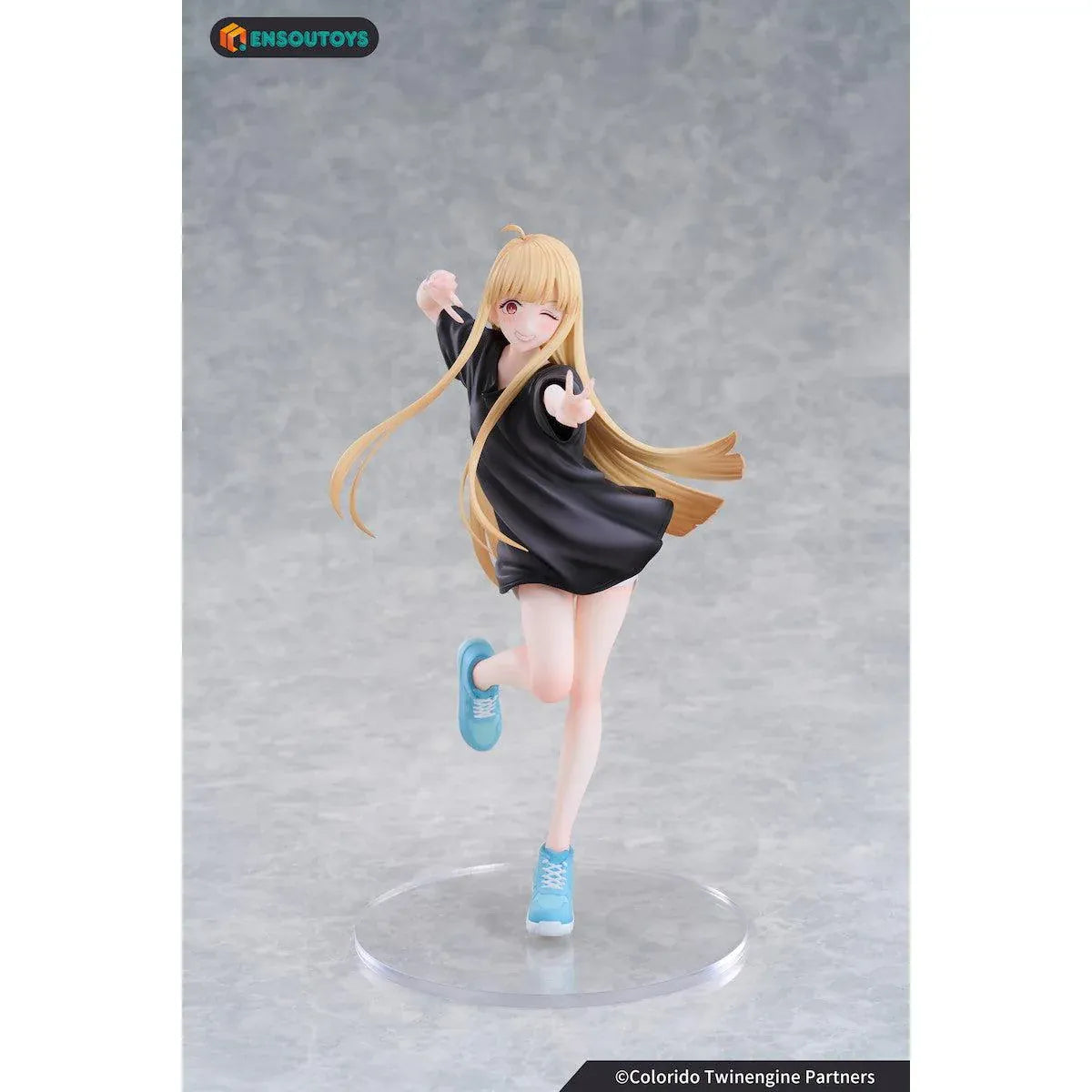 Kaguya In the Real World Ver. 1/7 scale figure with flowing blonde hair, a black outfit, blue sneakers, and a winking peace-sign pose.
