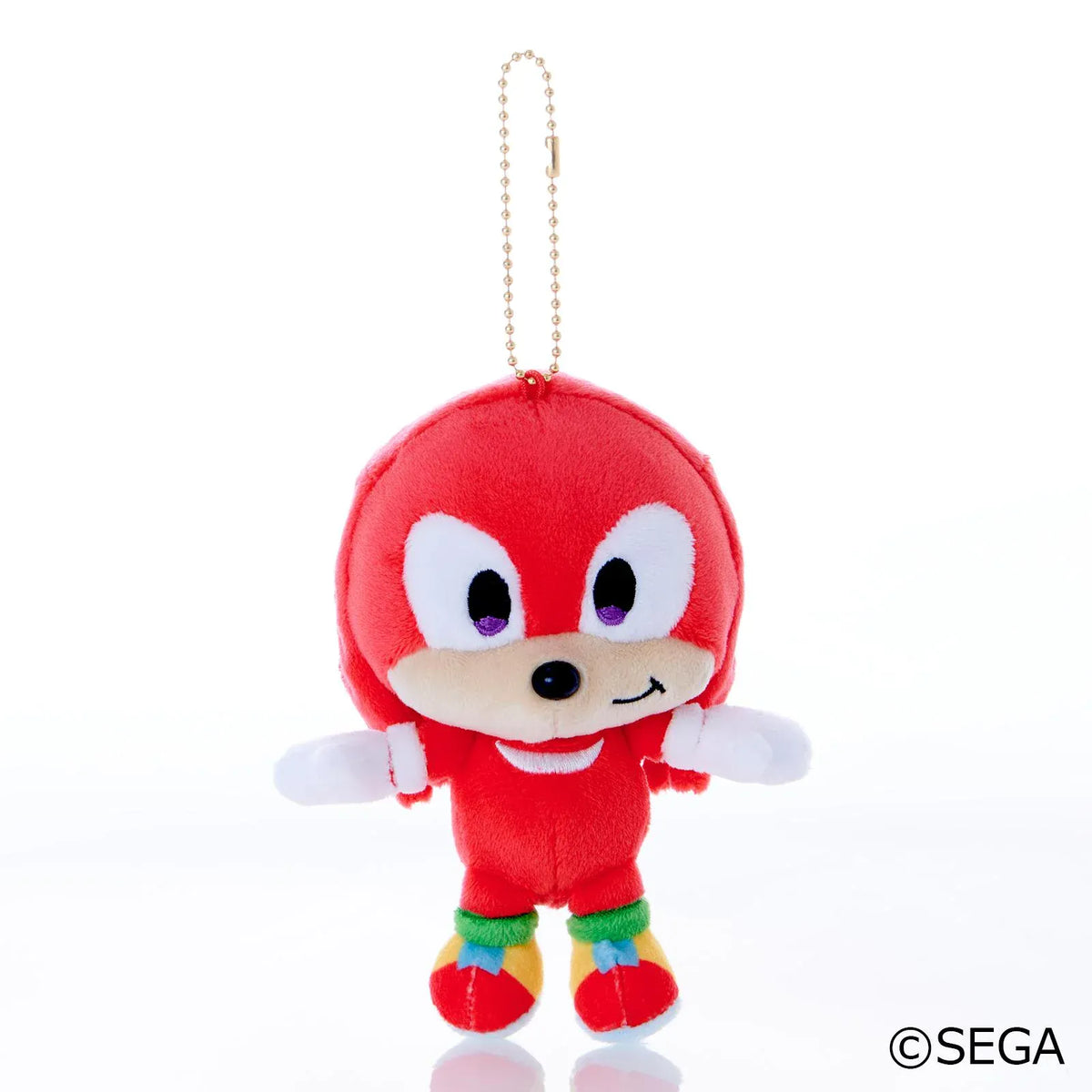 Sonic & Friends Knuckles mascot plush with purple eyes, spiked gloves, colorful shoes, and an attached ball chain.