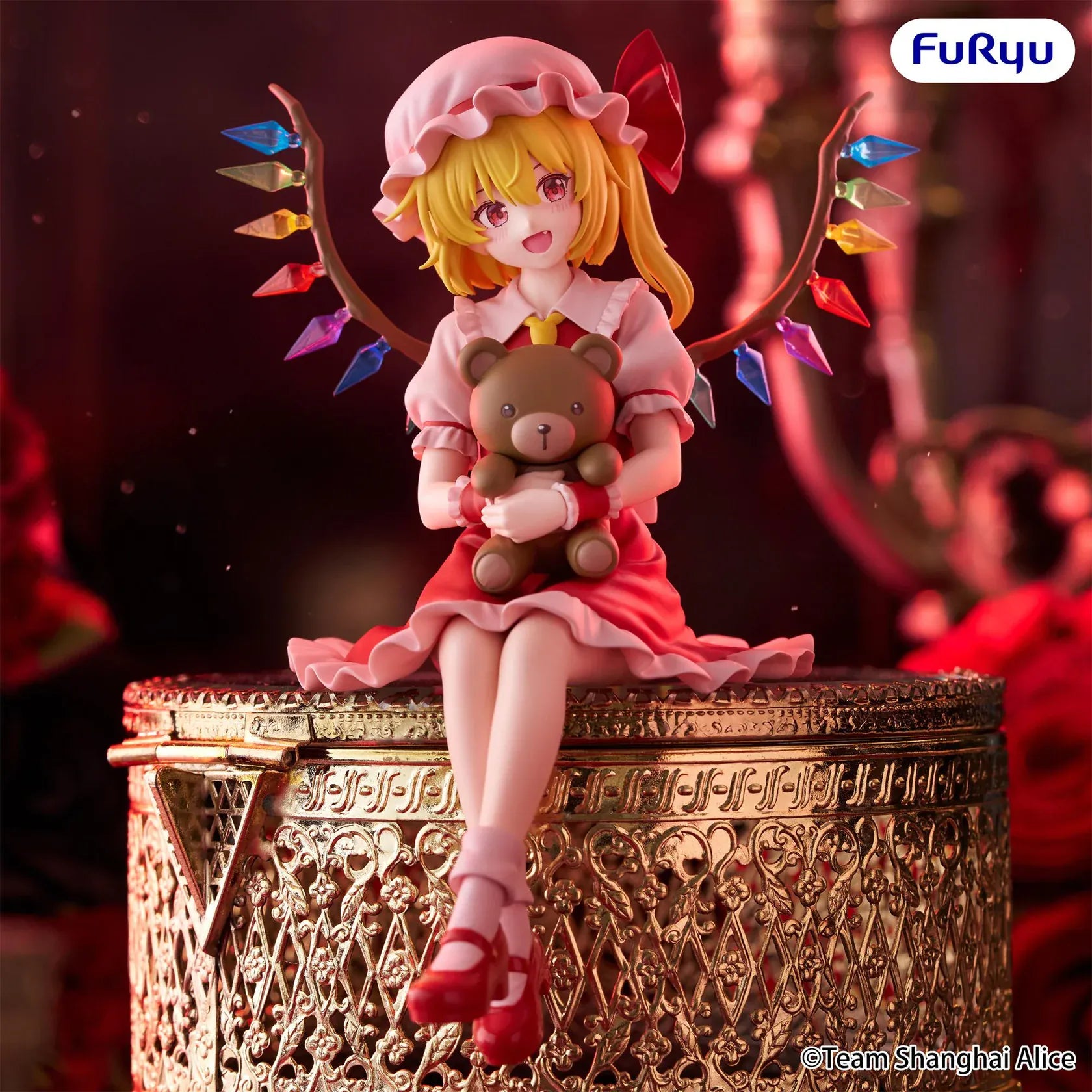 Touhou Project Flandre Scarlet Noodle Stopper figure holding a teddy bear with colorful crystal wings and a seated pose