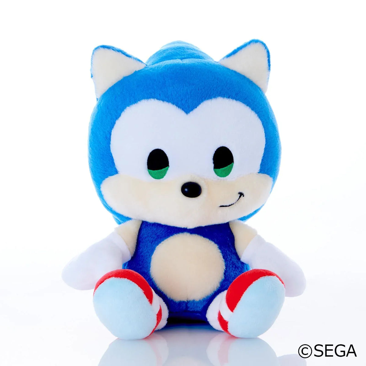 Sonic & Friends Sonic medium plush with green eyes, white gloves, and red shoes.