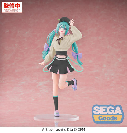 Hatsune Miku Luminasta Stroll Ver. figure wearing a cream hooded top, black skirt and cap, with lavender hair bows and pastel sneakers.