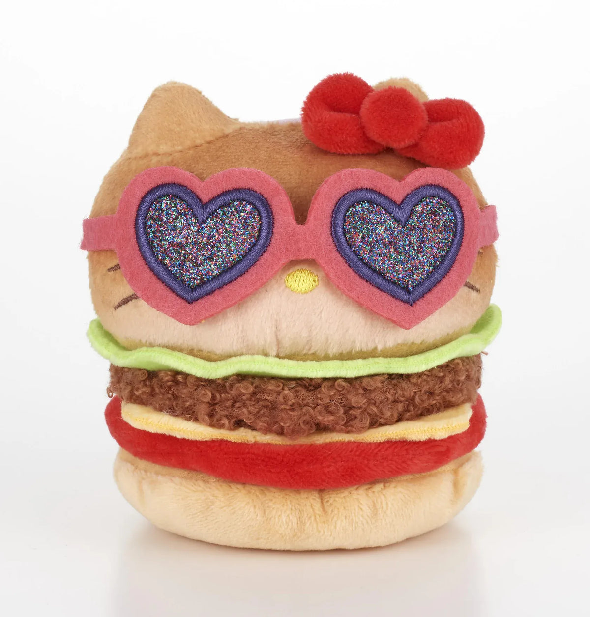 Kawaii YumYum MART DINER Hello Kitty BLT Burger plushie featuring layered burger ingredients, a red bow, and sparkly heart-shaped sunglasses.