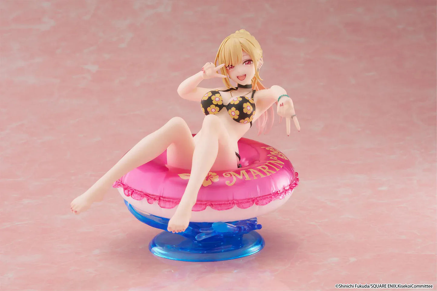My Dress-Up Darling Aqua Float Girls Marin Kitagawa Figure Rerelease featuring Marin relaxing on a pink swim float with floral swimsuit and translucent water-style base.