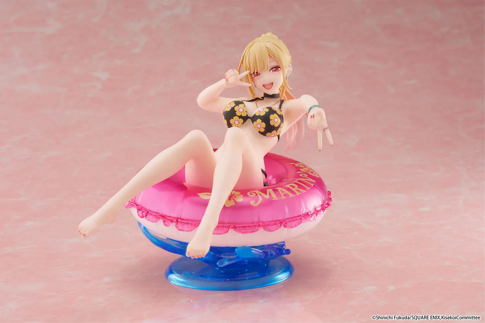 My Dress-Up Darling Aqua Float Girls Marin Kitagawa Figure Rerelease featuring Marin relaxing on a pink swim float with floral swimsuit and translucent water-style base.