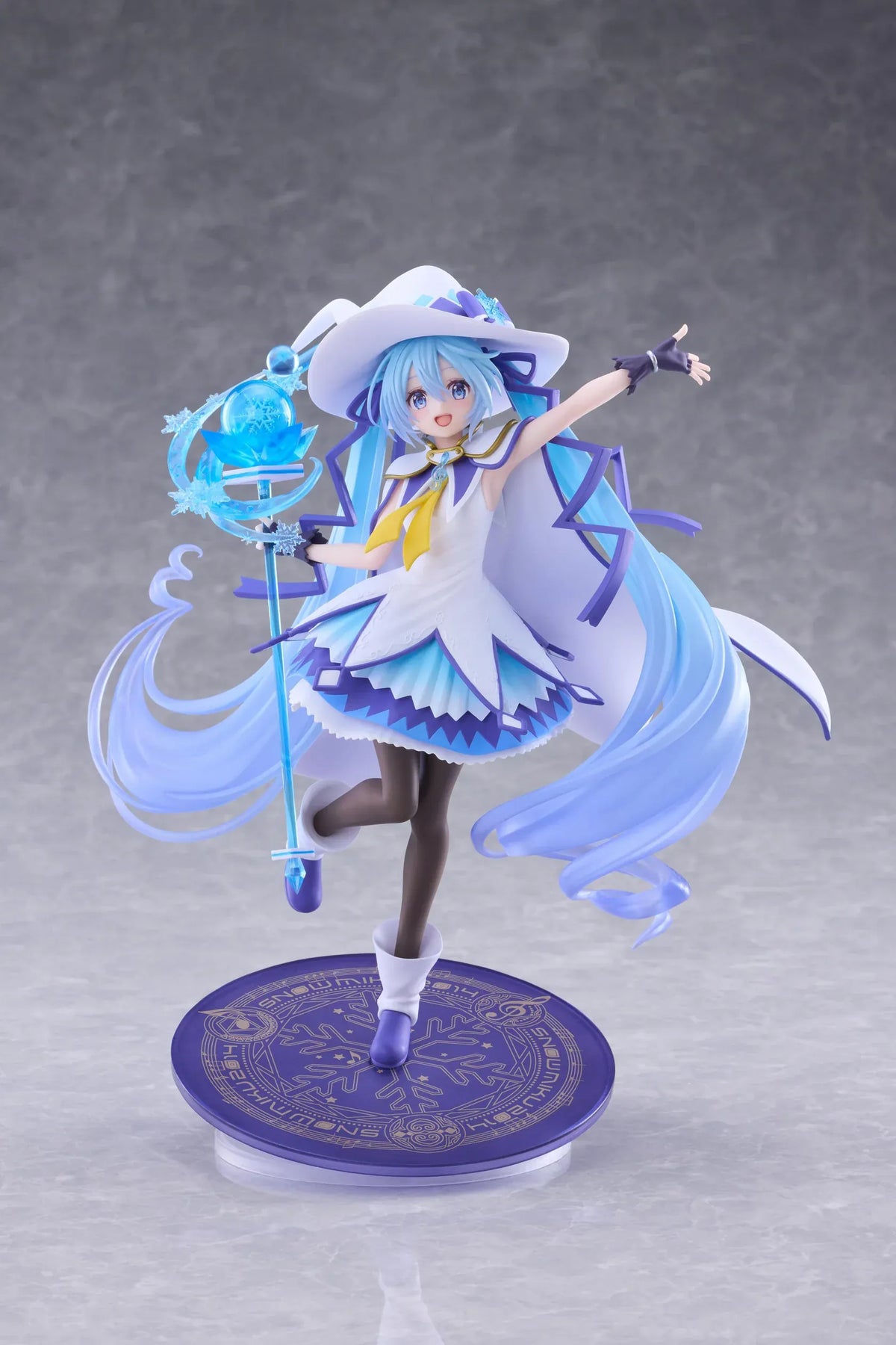 Snow Miku All Stars 2014 Ver. AMP+ figure wearing a white-and-blue snow sorceress outfit and holding a translucent magical staff.