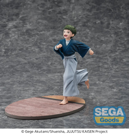 Luminasta Naoya Zen’in Childhood figure running barefoot in a blue top and gray hakama, smiling on an oval base with wood-style flooring.