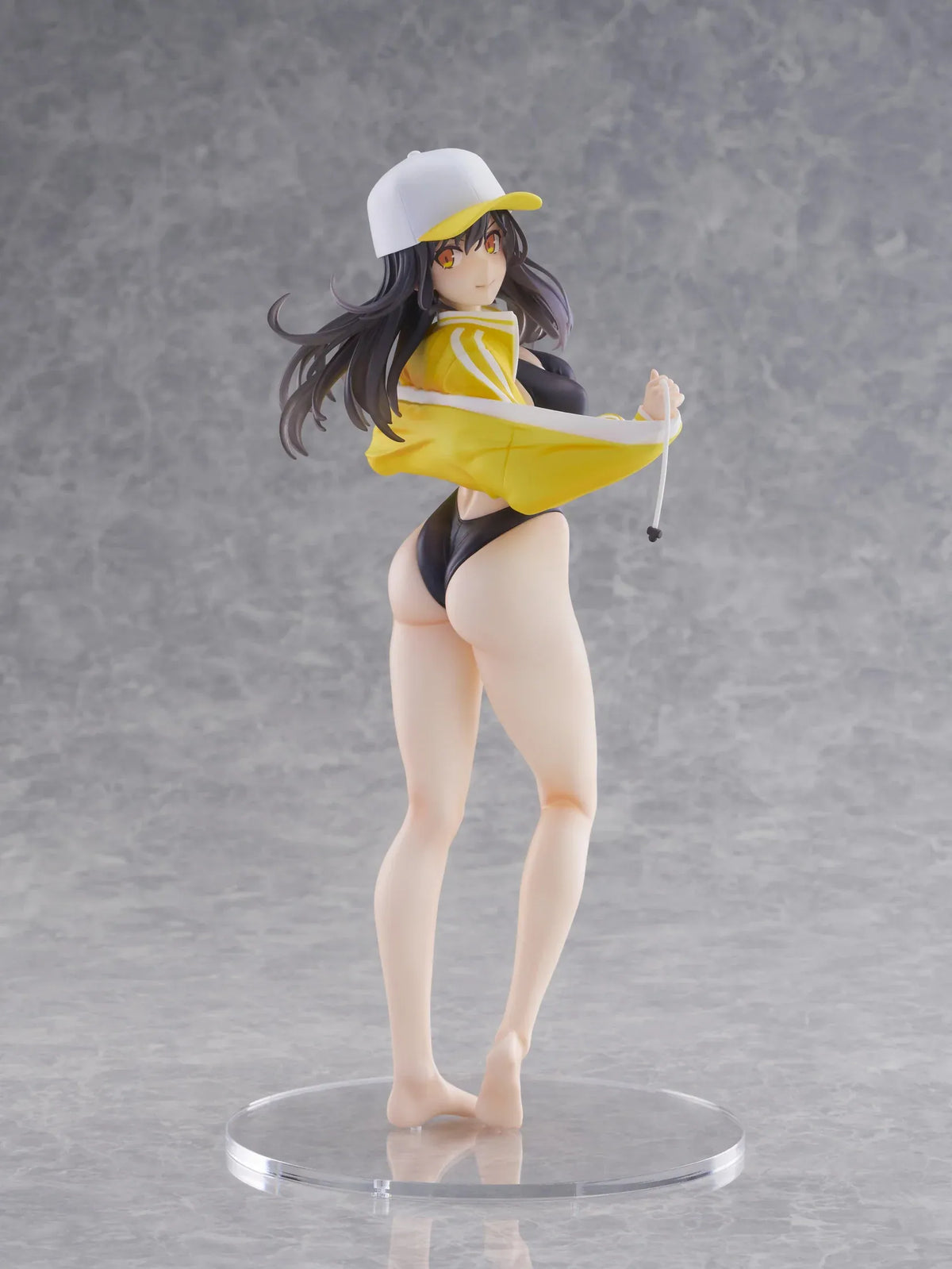 KoiKoi Sakura Kyou kara Suieibu Komon no Tama-chan Sensei 1/6 Scale Figure featuring a dark-haired anime woman with golden eyes wearing a black swimsuit, yellow athletic jacket, and white cap with a yellow brim, posing barefoot on a transparent circular base.