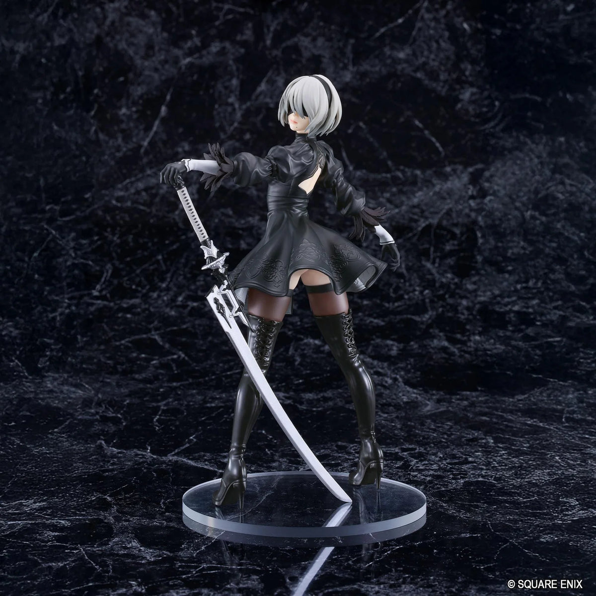 NieR POP UP PARADE 2B YoRHa No.2 Type B L Size Figure featuring a silver-white-haired android wearing a black gothic combat dress, thigh-high boots, and black gloves while holding a large sword on a circular display base.