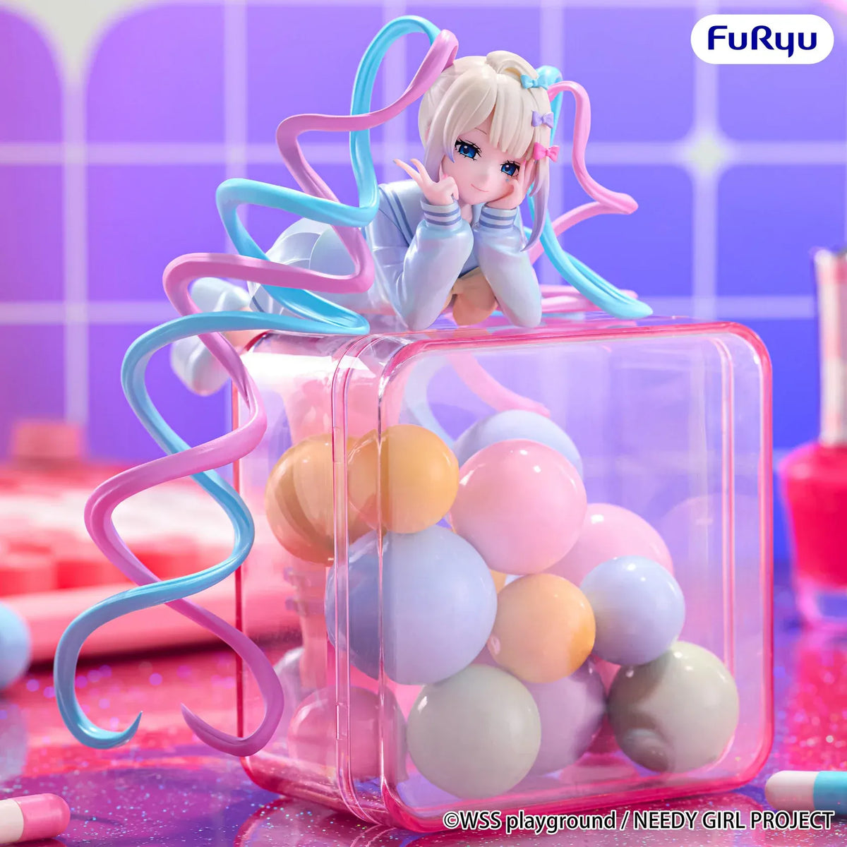 OMGKawaiiAngel Noodle Stopper figure featuring pink-and-blue twin tails, a sailor-inspired outfit, and a playful reclining pose.