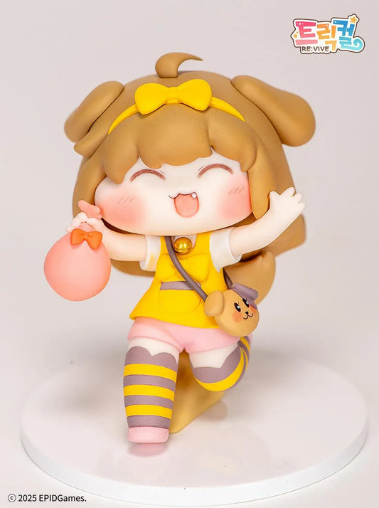 Trickal Chibi Go Butter Non Scale Figure (Rerelease) featuring a cheerful brown-haired character with floppy dog ears, a yellow bow, pink shorts, striped stockings, and a puppy-shaped shoulder bag.